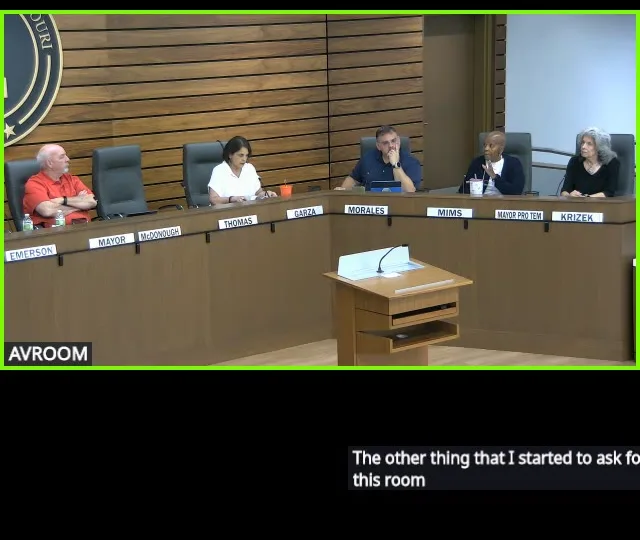 Name plates on the dais, Thomas, Garza, Morales, Mims, Krizek, during the August 11, 2026 meeting